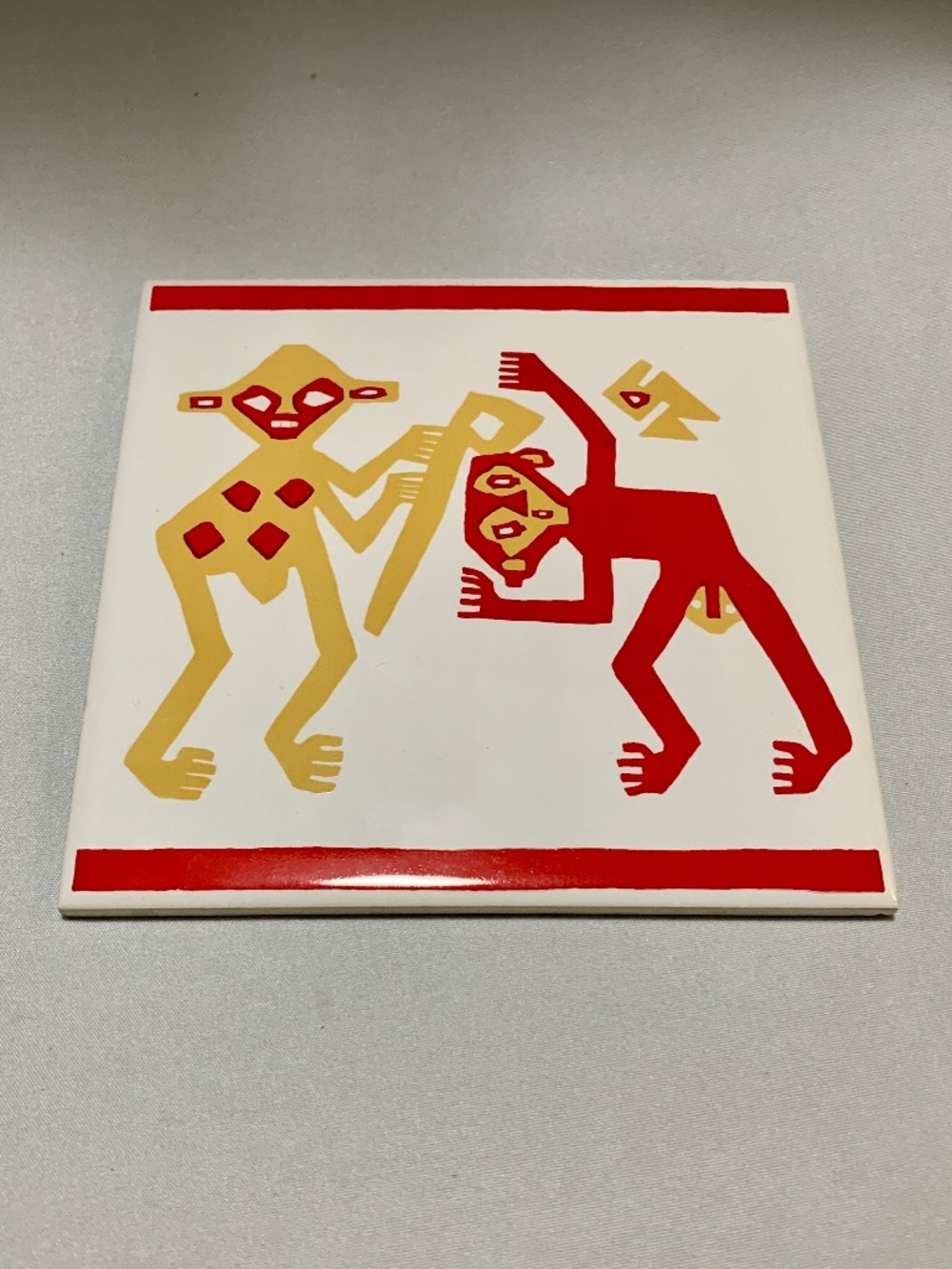 Ceramic Tile / Trivet - 2 Monkeys Fighting?? Measures 6” by 6"
